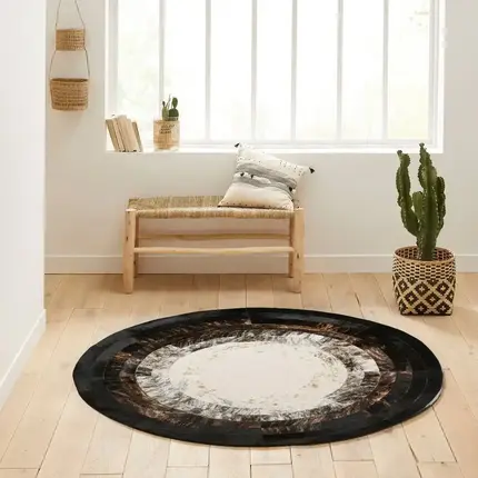 Black And White Round Calfskin Rug