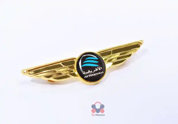 Gold brooch with African lines