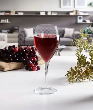 A glass juice cup with an elegant design, a set of 4 pieces